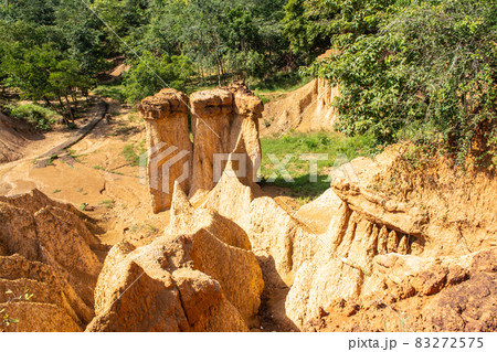 Within a national park named Phae Mueang Phi caused by the terrain which is the soil and sandstone was naturally eroded into various shapes that are In Phrae Province of Thailand. 83272575