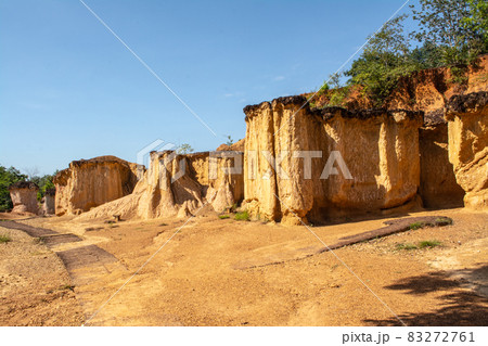 Within a national park named Phae Mueang Phi caused by the terrain which is the soil and sandstone was naturally eroded into various shapes that are In Phrae Province of Thailand. Within a national park named Phae Mueang Phi caused by the terrain which is the soil and sandstone was naturally eroded into various shapes that are In Phrae Province of Thailand. 83272761