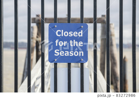 Closed for the season sign at Tacoma waterfront pier in Washington 83272986