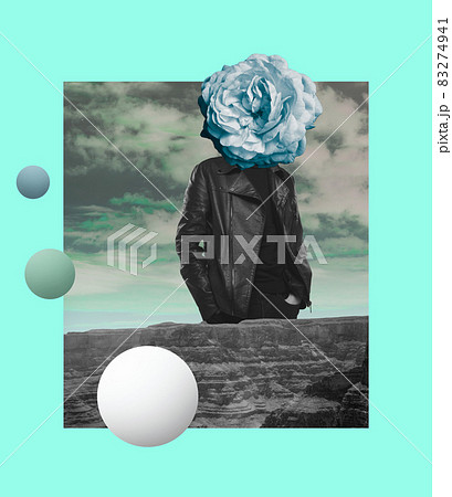 Contemporary art collage of man in black leather jacket with blue flower head isolated over sky and mountains background 83274941
