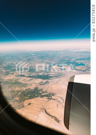 Aerial View Of Salt Marshes From Window Of Plane. Aerial View Of Fasnadaz village. Iran Aerial View Of Salt Marshes From Window Of Plane. Aerial View Of Fasnadaz village. Iran 83275819