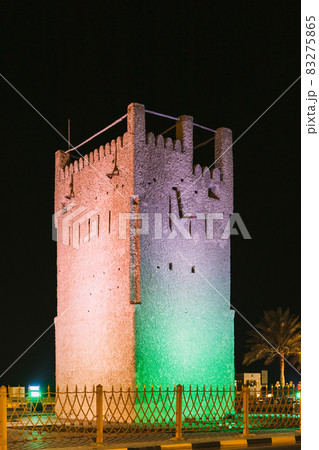 Night View Of Ancient Old Stone AlMurabbaa Watchtower Of Ajman. Close Up Details. Famous Landmark 83275865