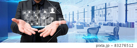 Picture Of Businessman Giving Ideas Presenting With His Both Hands Showing Amazing Futuristic Technology. Employee Sharing Knowledge Performing Wonderful Modern Automation. Picture Of Businessman Giving Ideas Presenting With His Both Hands Showing Amazing Futuristic Technology. Employee Sharing Knowledge Performing Wonderful Modern Automation. 83276512