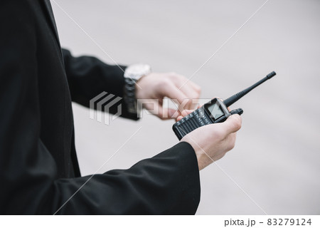 high angle security man outdoor. High quality and resolution beautiful photo concept high angle security man outdoor. High quality and resolution beautiful photo concept 83279124