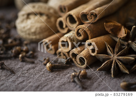 high angle arrangement with nuts cinnamon sticks. High quality and resolution beautiful photo concept 83279169