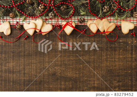 heart cookies with green branches cones. High quality and resolution beautiful photo concept 83279452