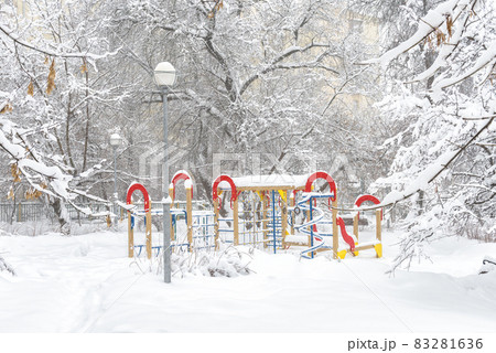 Winter landscape in Moscow, Russia. Scenery of snowy trees and playground Winter landscape in Moscow, Russia. Scenery of snowy trees and playground 83281636