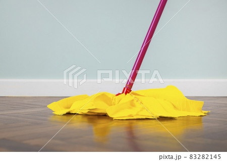 House cleaning tools on parquet 83282145