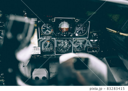 Vintage airplane dashboard contain the standard indicator for control the airplane inflight 83283415
