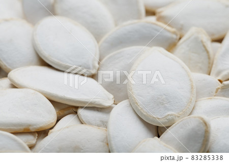 Pumpkin seeds in a shell as a textural background. 83285338