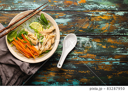 Asian soup with noodles in bowl top view copy space 83287950