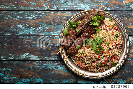 Arab Turkish kebab with tabbouleh salad 83287965