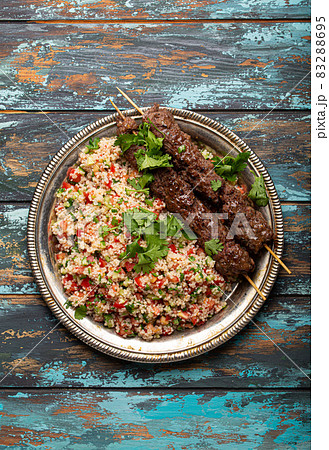 Arab Turkish kebab with tabbouleh salad 83288695