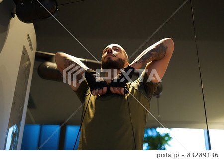 Davide Malfitano a fit handsom young Caucasian male works out in a gym. 83289136