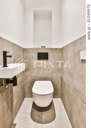 Little elegant bathroom with faucet and toilet Little elegant bathroom with faucet and toilet 83289976