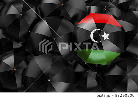Umbrella with Libyan flag among black umbrellas, 3D rendering 83290506