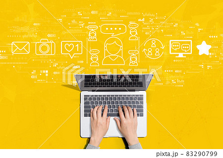 Social media theme with person using laptop 83290799