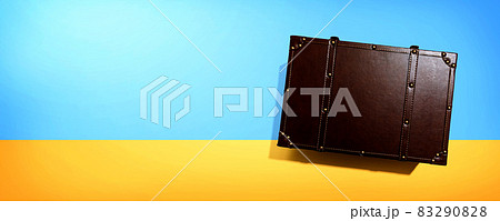 Travel theme with a old fashioned suitcase Travel theme with a old fashioned suitcase 83290828