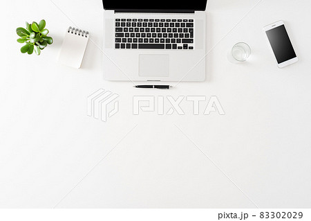 Office desktop with laptop and accessories 83302029