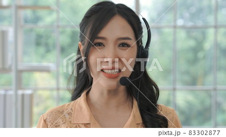 Video call camera view of businesswoman talks actively in videoconference 83302877