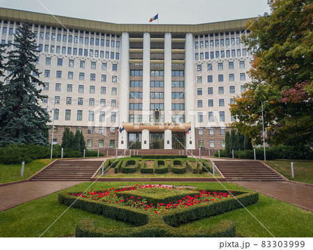Republic of Moldova parliament building with beautiful garden. Rainy autumn day outdoors. Republic of Moldova parliament building with beautiful garden. Rainy autumn day outdoors. 83303999