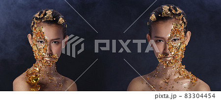Gold Leaf High fashion style on Asian Woman Face dark mystery look Gold Leaf High fashion style on Asian Woman Face dark mystery look 83304454