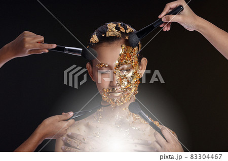 Gold Leaf High fashion style on Asian Woman Face dark mystery look Gold Leaf High fashion style on Asian Woman Face dark mystery look 83304467