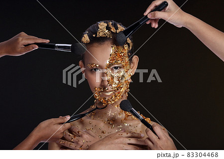 Gold Leaf High fashion style on Asian Woman Face dark mystery look Gold Leaf High fashion style on Asian Woman Face dark mystery look 83304468