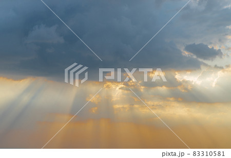 The cloudy beautiful sky with the light shining from the sun. The cloudy beautiful sky with the light shining from the sun. 83310581