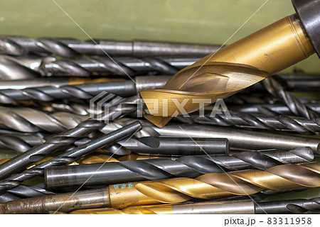 The group of various size of drill tools on the container box. The group of various size of drill tools on the container box. 83311958