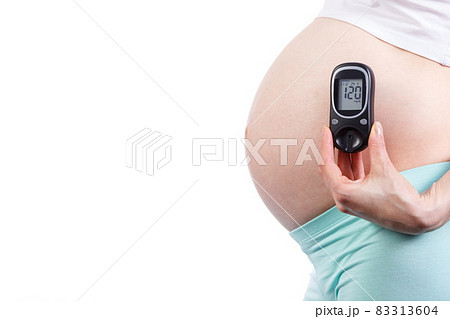Pregnant woman with glucometer, diabetes during pregnancy Pregnant woman with glucometer, diabetes during pregnancy 83313604