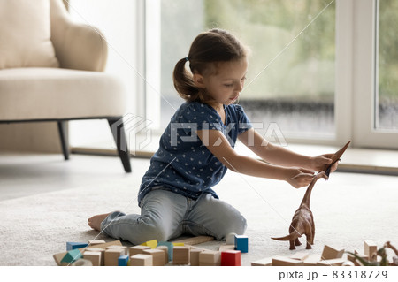 Adorable little preschool child girl playing toys. Adorable little preschool child girl playing toys. 83318729