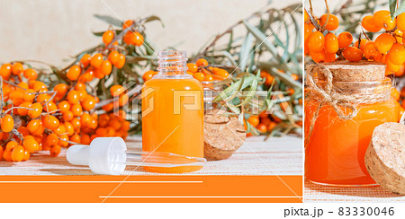 Collage of cosmetology, alternative herbal medicine and herbal medicine. Bleckthorn berries and natural cosmetic oil in a bottle with a pipette for personal care 83330046