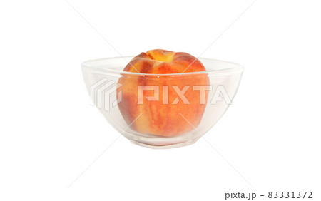 Big ripe peach in a vase of transparent glass 83331372