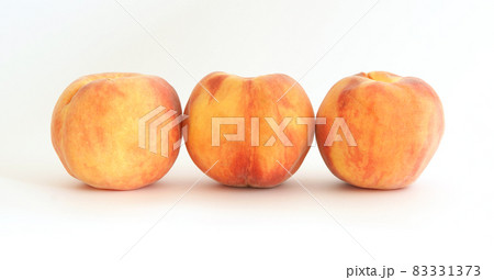 Three large ripe peaches 83331373