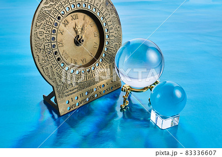 Christmas and New Year miracles and fortune-telling, the magic crystal ball with magic clock. Christmas and New Year miracles and fortune-telling, the magic crystal ball with magic clock. 83336607