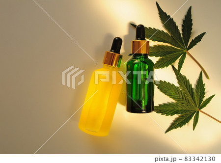 Cannabis leaves, cbd oil. Marihuana extract in cosmetology. Cannabis leaves, cbd oil. Marihuana extract in cosmetology. 83342130