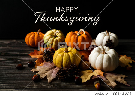 Happy Thanksgiving Day with pumpkin and nut on wooden table Happy Thanksgiving Day with pumpkin and nut on wooden table 83343974