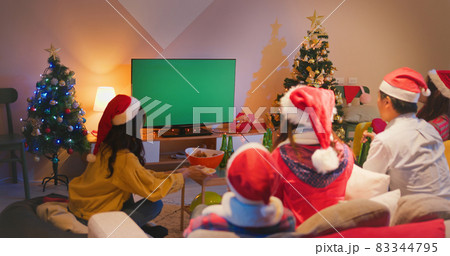friends watch TV while Christmas 83344795