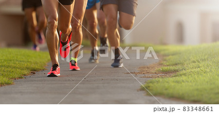 Marathon running race, athletes running on city sidewalk 83348661