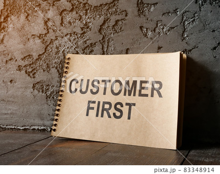 Customer first phrase on the notepad sheet. Customer first phrase on the notepad sheet. 83348914