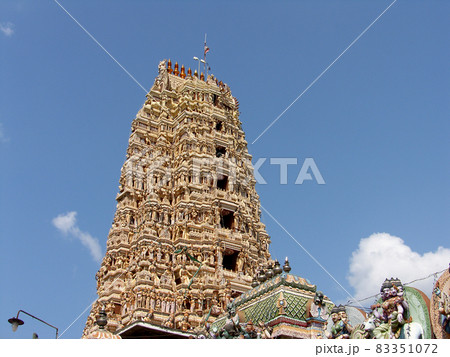 Shri-lanka, the Buddistsky temple with set of religious sculptures against the blue sky Shri-lanka, the Buddistsky temple with set of religious sculptures against the blue sky 83351072