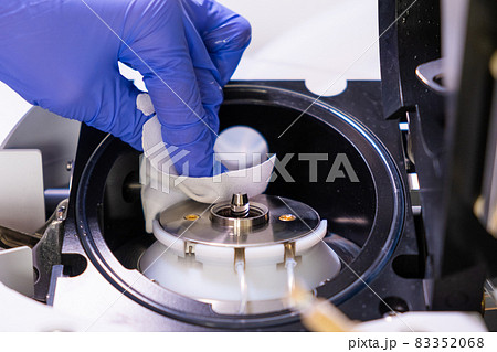 Cleaning of ion source of mass spectrometer by laboratory worker in rubber gloves. LC MS, liquid chromatography and daily routine Cleaning of ion source of mass spectrometer by laboratory worker in rubber gloves. LC MS, liquid chromatography and daily routine 83352068