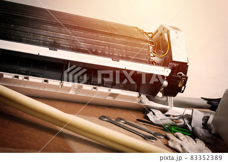 repairing the air conditioner 83352389