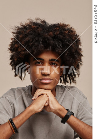 Handsome Young Man with Natural Hair Handsome Young Man with Natural Hair 83353043