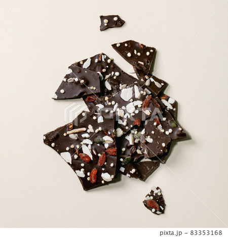Handmade chopped dark chocolate with different superfood 83353168