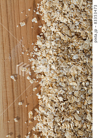 Cereals and healthy eating concept - oatmeal flakes. Cereals and healthy eating concept - oatmeal flakes. 83353473