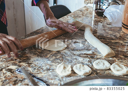 Woman cooking at home 83355025