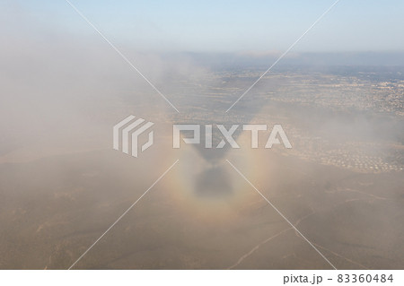 The shoadow of hot air balloons on the clouds 83360484
