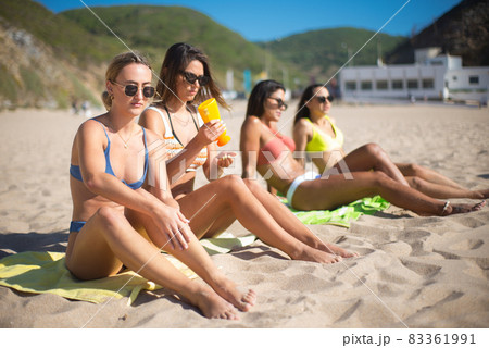 Attractive friends in sunglasses at bikini party Attractive friends in sunglasses at bikini party 83361991